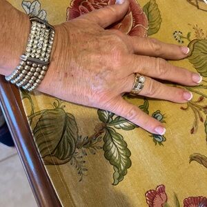 Real Gold Ring with real diamonds the large center diamond is stunning.